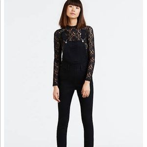 Black Levi’s overalls